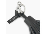 Porte clés pompons en cuir lisse