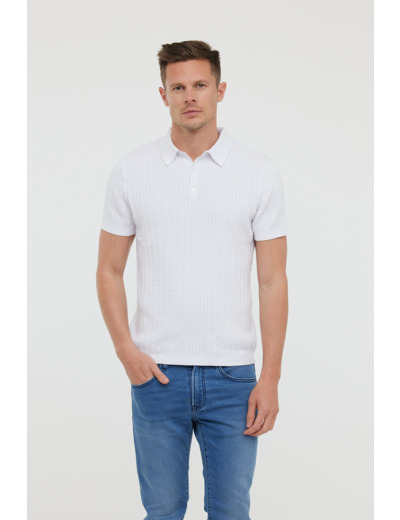 Polo en maille torsadée de coton biologique. Vendu avec une pochette de badges à thermocoller soi même pour personnaliser