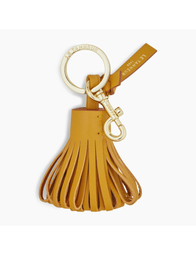 Porte clés pompons en cuir lisse