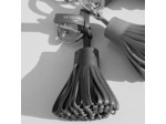 Porte clés pompons en cuir lisse