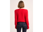 Pull droit avec des boutons aux poignets