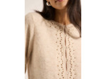 Gilet avec des boutons ronds et des manches longues