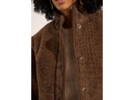 Veste courte en fausse fourrure et col matelassé