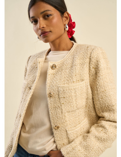 Veste en tweed et boutons bijoux